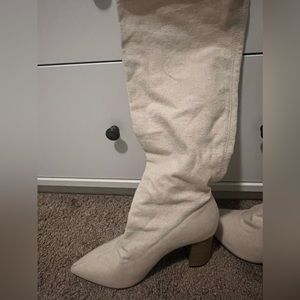 Tall, white/cream fabric heeled boots from JustFab